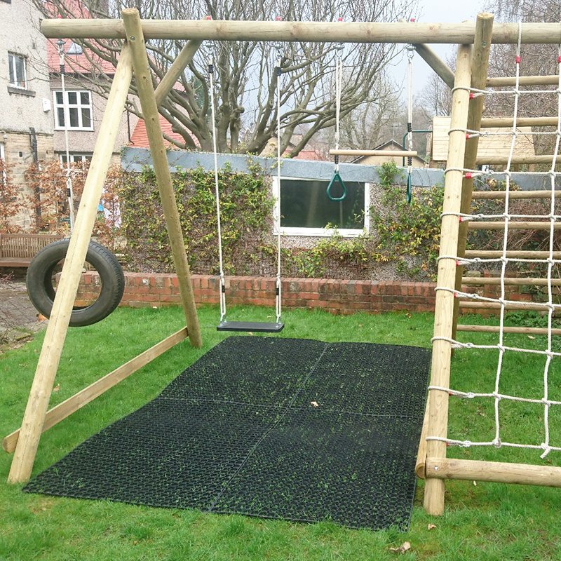 https://www.matsgrids.co.uk/blogs/wp-content/uploads/sites/2/2018/05/Rubber-Grass-Mats-Installed-Under-A-Caledonia-Play-Swing-Set-work-1.jpg