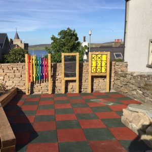 Rubber Playground Tiles In Use - Red & Green